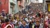 FILE - Migrants begin their journey north in hopes of reaching the US border, in Tapachula, Chiapas state, Mexico, April 23, 2023. 